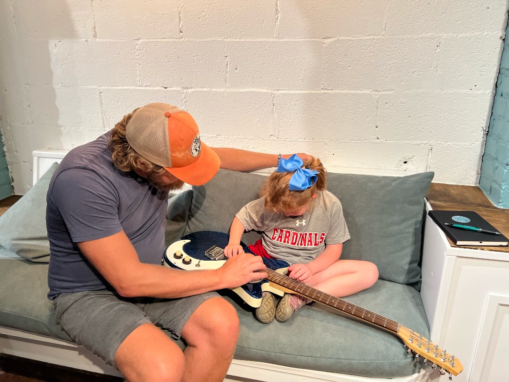 Acoustic guitar practice in the Clubhouse